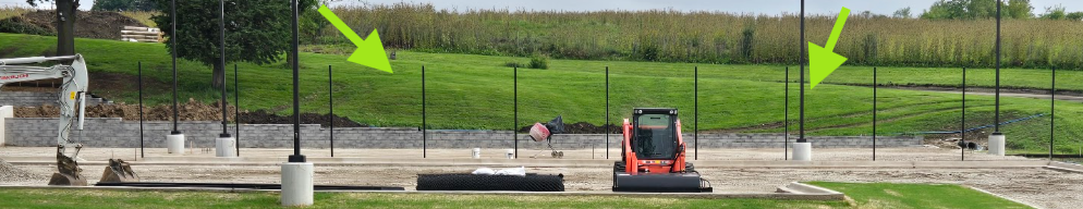 Fencing between basketball court and parking